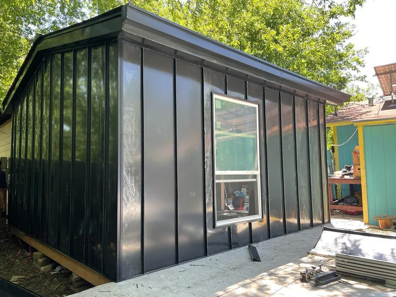 Black standing seam metal wall panels for Roof Inspection in Bolivar