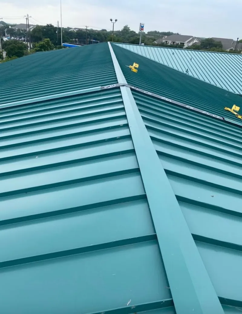 Green commercial metal roof ridge and valley for Metal Roof Repair in Bolivar